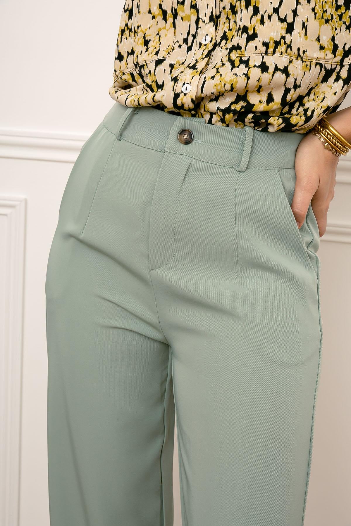 pastel green trousers
